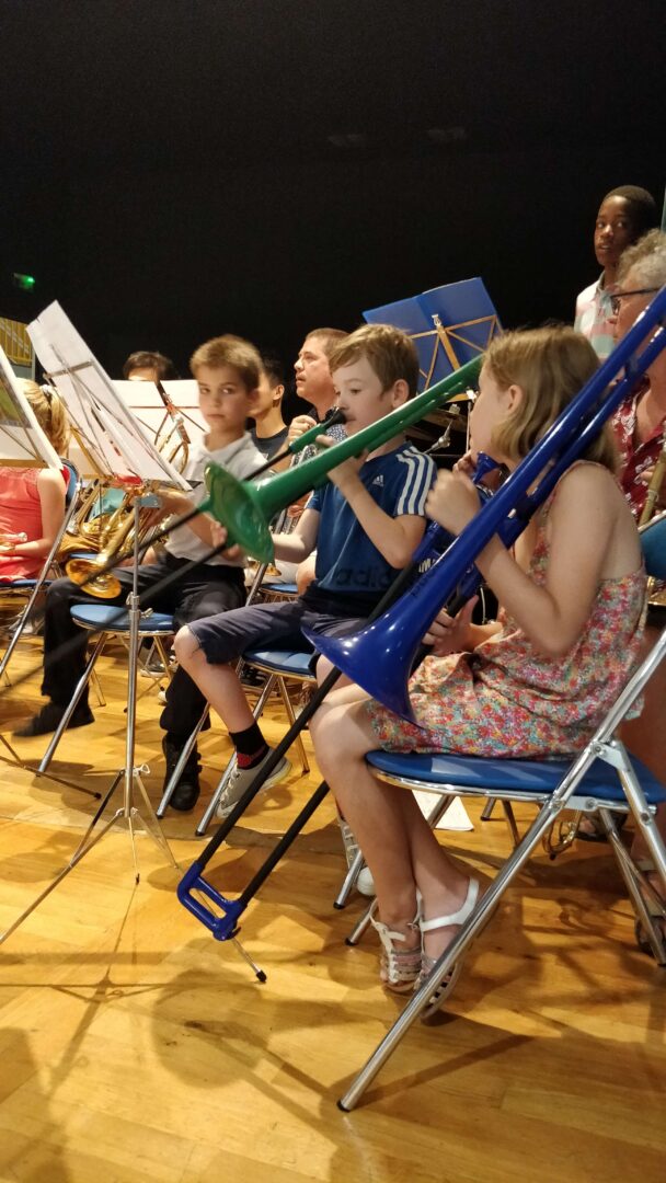 Logan et son trombone au concert des petits de l'école de musique de Rosières.